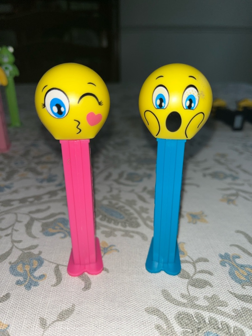 Emoji Face PEZ Dispenser Toy - Yellow Head with Pink and Blue Stems